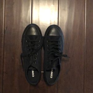 Women’s black platform converse.